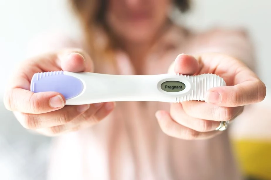 Image of women with a positive pregnancy rest